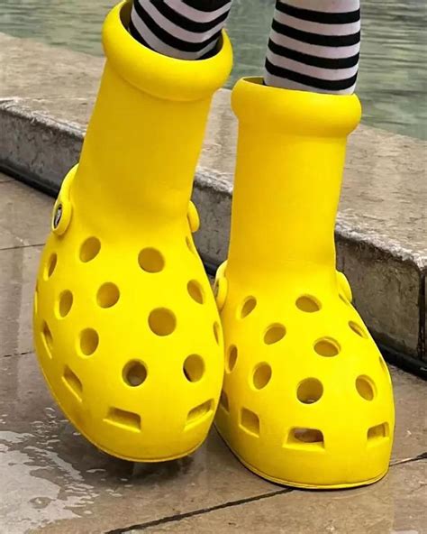 big yellow crocs boots.